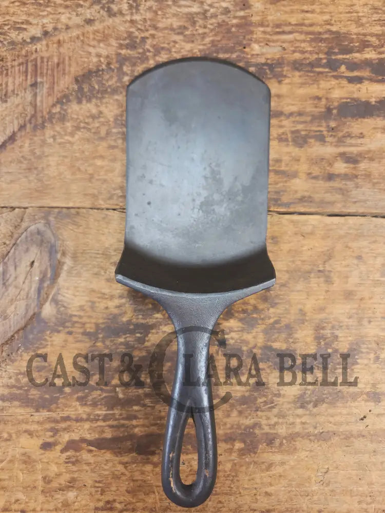 Custom made one of a kind vintage Lodge 5SK 1 repurposed spatula. Turned an ordinary cracked skillet into a grill