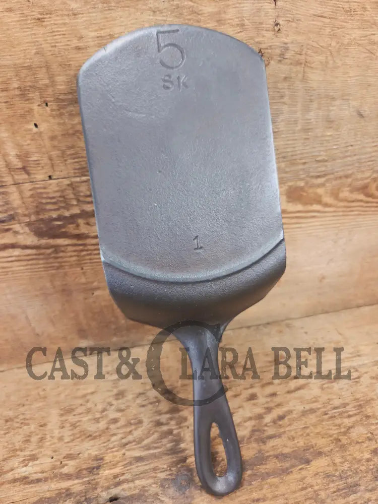 Custom made one of a kind vintage Lodge 5SK 1 repurposed spatula. Turned an ordinary cracked skillet into a grill