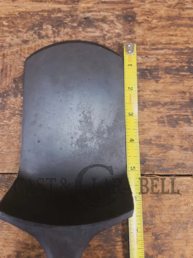 Custom made one of a kind vintage Lodge 5SK 1 repurposed spatula. Turned an ordinary cracked skillet into a grill