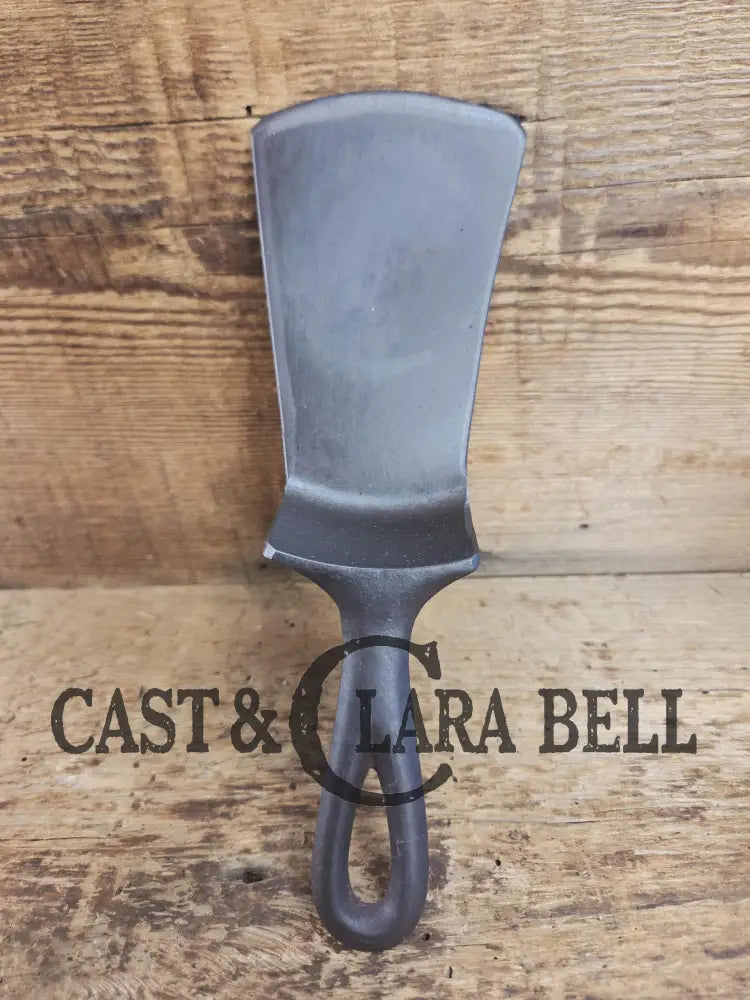 Custom made small Lodge Arc Logo Cast Iron Skillet Spatula. Reclaimed from a early 1900’s Lodge Arc cast iron skillet.