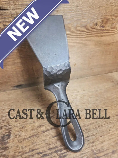 Custom made small Wagner HAMMERED Cast Iron Skillet Spatula. Reclaimed from a #3 Wagner hammered cast iron skillet.