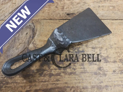 Custom made small Wagner HAMMERED Cast Iron Skillet Spatula. Reclaimed from a #3 Wagner hammered cast iron skillet.