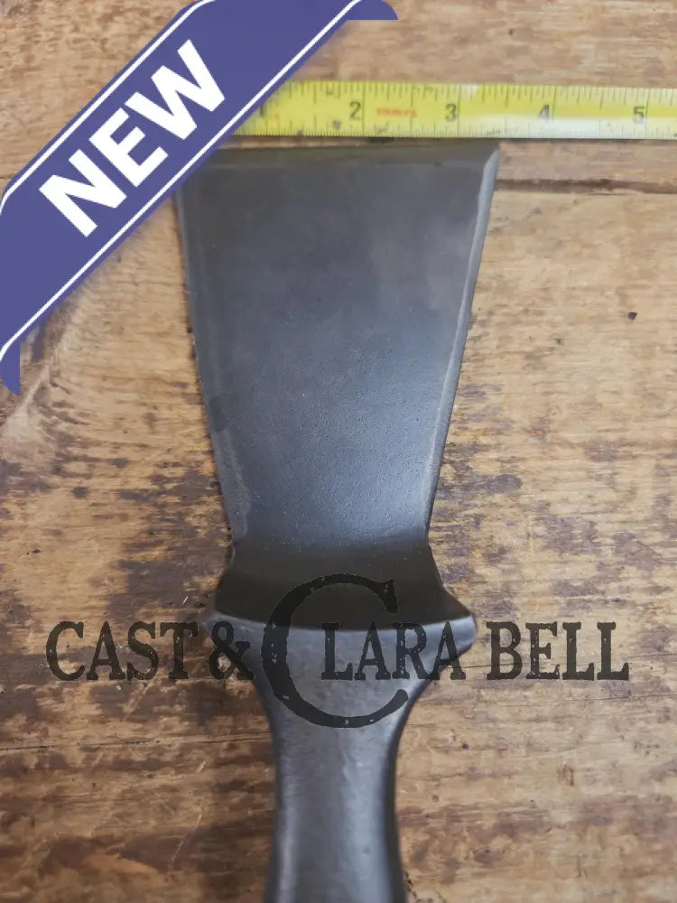 Custom made small Wagner HAMMERED Cast Iron Skillet Spatula. Reclaimed from a #3 Wagner hammered cast iron skillet.