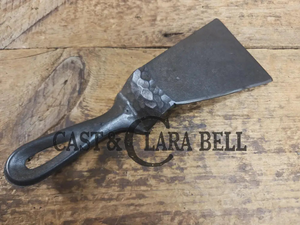 Custom made small Wagner HAMMERED Cast Iron Skillet Spatula. Reclaimed from a #3 Wagner hammered cast iron skillet.