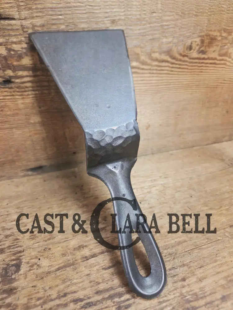 Custom made small Wagner HAMMERED Cast Iron Skillet Spatula. Reclaimed from a #3 Wagner hammered cast iron skillet.