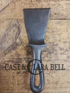 Custom made small Wagner HAMMERED Cast Iron Skillet Spatula. Reclaimed from a #3 Wagner hammered cast iron skillet.