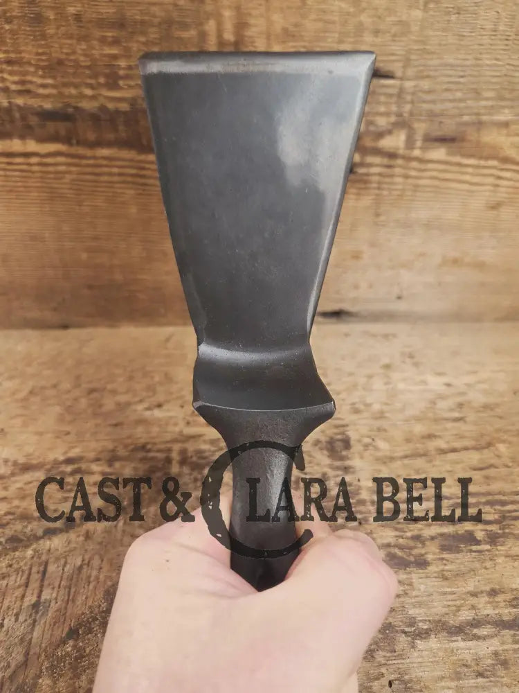 Custom made small Wagner HAMMERED Cast Iron Skillet Spatula. Reclaimed from a #3 Wagner hammered cast iron skillet.