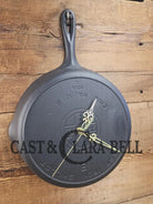 Custom made wall hanging Griswold Clock. Repurposed from cracked skillet. Comes with interchangeable clock mechanics.