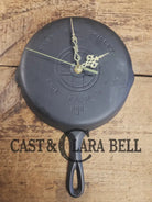 Custom made wall hanging Griswold Clock. Repurposed from cracked skillet. Comes with interchangeable clock mechanics.