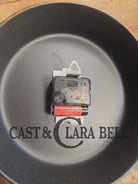 Custom made wall hanging Griswold Clock. Repurposed from cracked skillet. Comes with interchangeable clock mechanics.