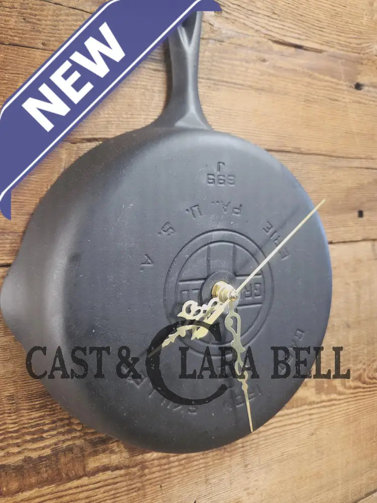 Custom made wall hanging Griswold Clock. Repurposed from cracked skillet. Comes with interchangeable clock mechanics.