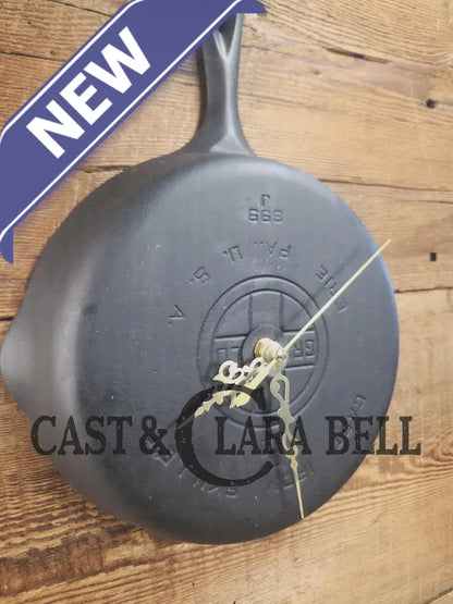 Custom made wall hanging Griswold Clock. Repurposed from cracked skillet. Comes with interchangeable clock mechanics.