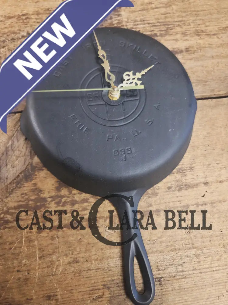 Custom made wall hanging Griswold Clock. Repurposed from cracked skillet. Comes with interchangeable clock mechanics.