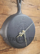 Custom made wall hanging Griswold Clock. Repurposed from cracked skillet. Comes with interchangeable clock mechanics.
