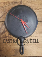 Custom made wall hanging Griswold Clock. Repurposed from cracked skillet. Comes with interchangeable clock mechanics.