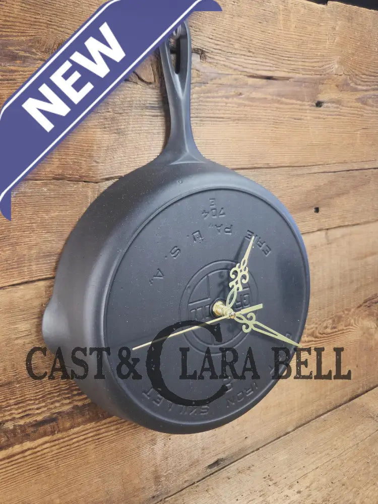 Custom made wall hanging Griswold Clock. Repurposed from cracked skillet. Comes with interchangeable clock mechanics.
