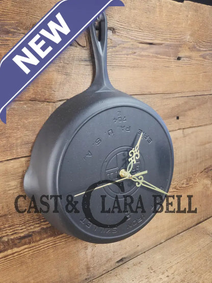 Custom made wall hanging Griswold Clock. Repurposed from cracked skillet. Comes with interchangeable clock mechanics.