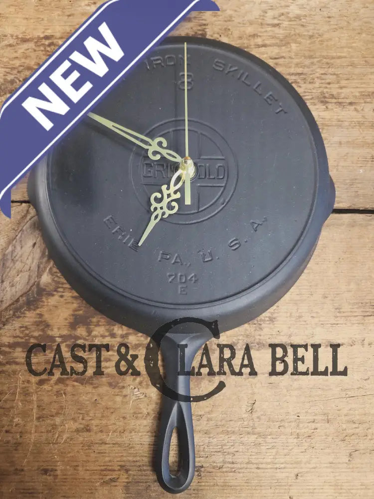 Custom made wall hanging Griswold Clock. Repurposed from cracked skillet. Comes with interchangeable clock mechanics.