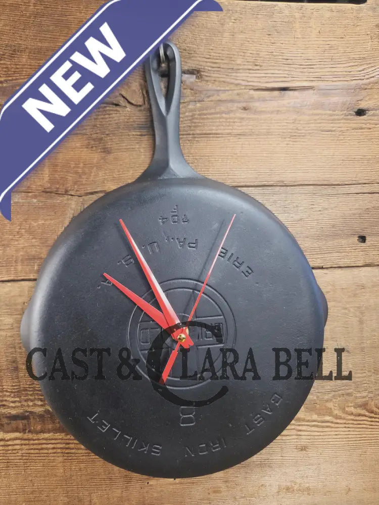 Custom made wall hanging Griswold Clock. Repurposed from cracked skillet. Comes with interchangeable clock mechanics.