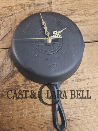 Custom made wall hanging Griswold Clock. Repurposed from cracked skillet. Comes with interchangeable clock mechanics.