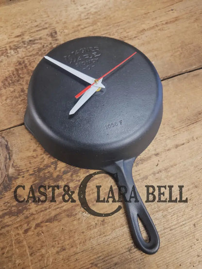 Custom made wall hanging Griswold Clock. Repurposed from cracked skillet. Comes with interchangeable clock mechanics.