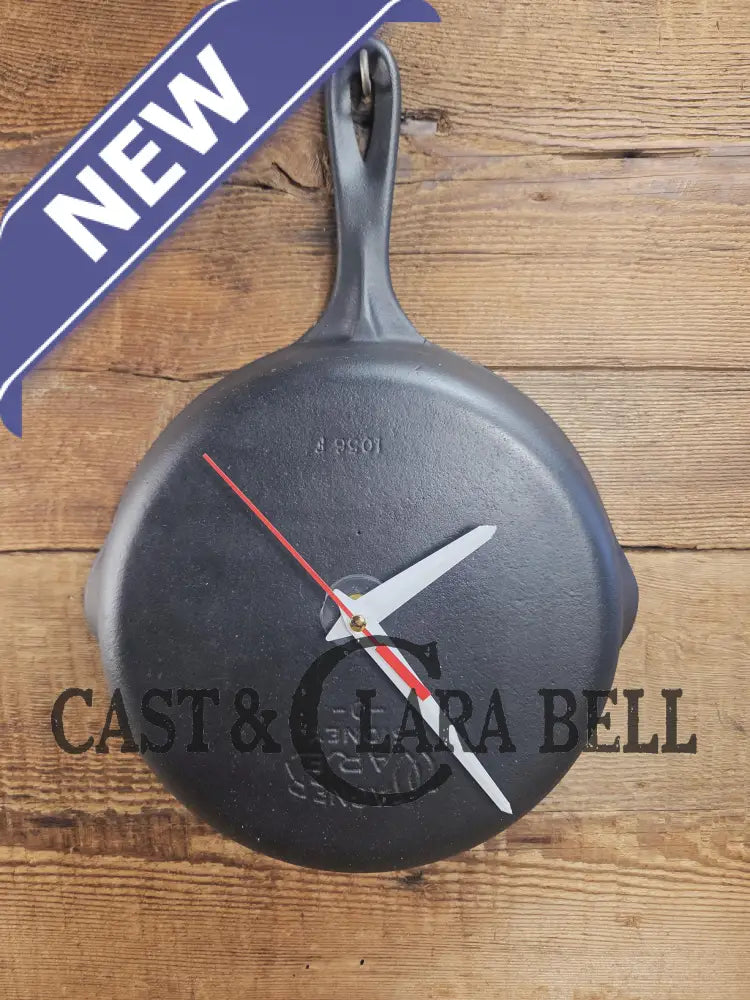 Custom made wall hanging Griswold Clock. Repurposed from cracked skillet. Comes with interchangeable clock mechanics.