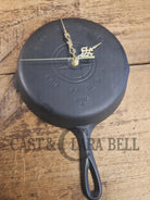 Custom made wall hanging Griswold Clock. Repurposed from cracked skillet. Comes with interchangeable clock mechanics.