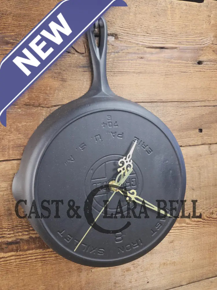 Custom made wall hanging Griswold Clock. Repurposed from cracked skillet. Comes with interchangeable clock mechanics.