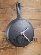 Custom made wall hanging Griswold Clock. Repurposed from cracked skillet. Comes with interchangeable clock mechanics.