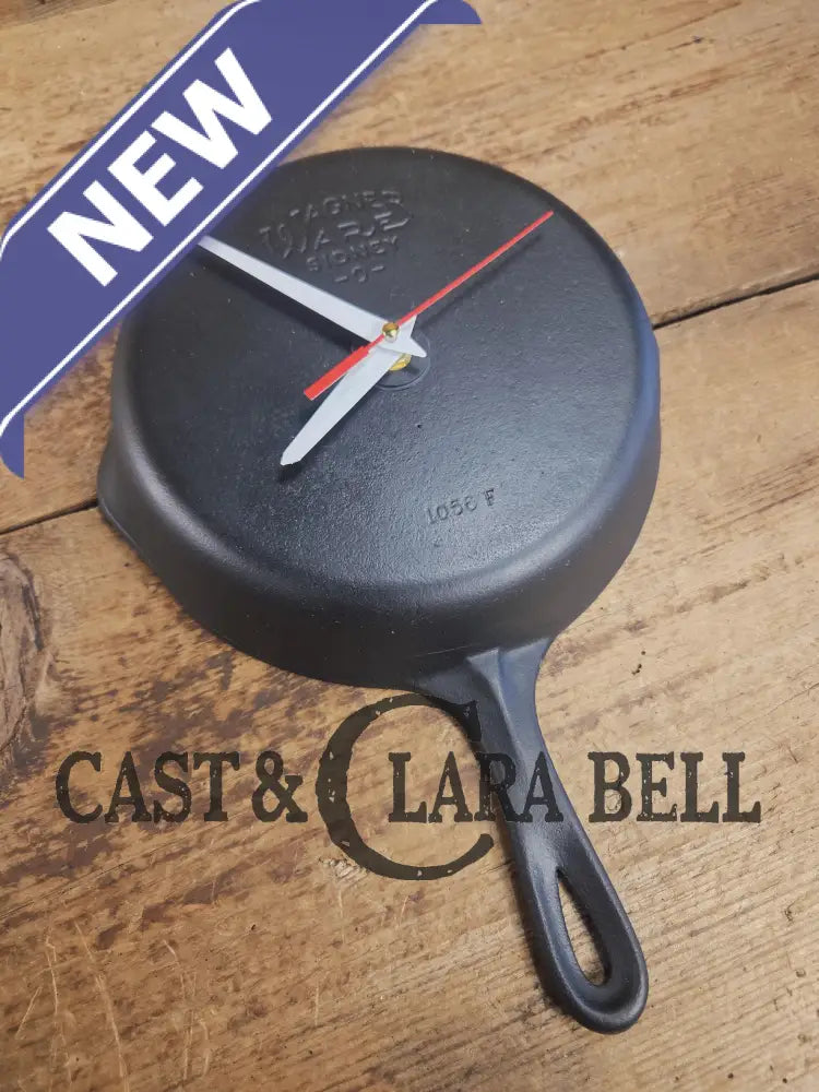 Custom made wall hanging Griswold Clock. Repurposed from cracked skillet. Comes with interchangeable clock mechanics.