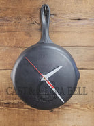 Custom made wall hanging Wagner Clock. Repurposed from cracked skillet. Comes with interchangeable clock mechanics.
