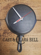 Custom made wall hanging Wagner Clock. Repurposed from cracked skillet. Comes with interchangeable clock mechanics.