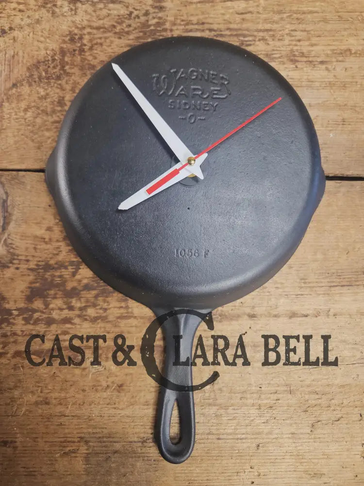Custom made wall hanging Wagner Clock. Repurposed from cracked skillet. Comes with interchangeable clock mechanics.