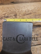 Custom Repurposed Burger Spatula AND grill scraper. Made from a center cracked Griswold 704 skillet. Awesome for the