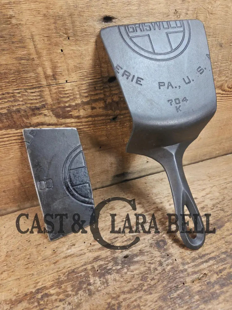 Custom Repurposed Burger Spatula AND grill scraper. Made from a center cracked Griswold 704 skillet. Awesome for the