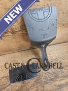 Custom Repurposed Burger Spatula AND grill scraper. Made from a center cracked Griswold 704 skillet. Awesome for the
