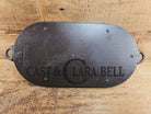 Early 1900’s (Lodge?) #7 cast iron long pan with foot nubs. Perfect for two people or quick meals. VERY cool griddle to