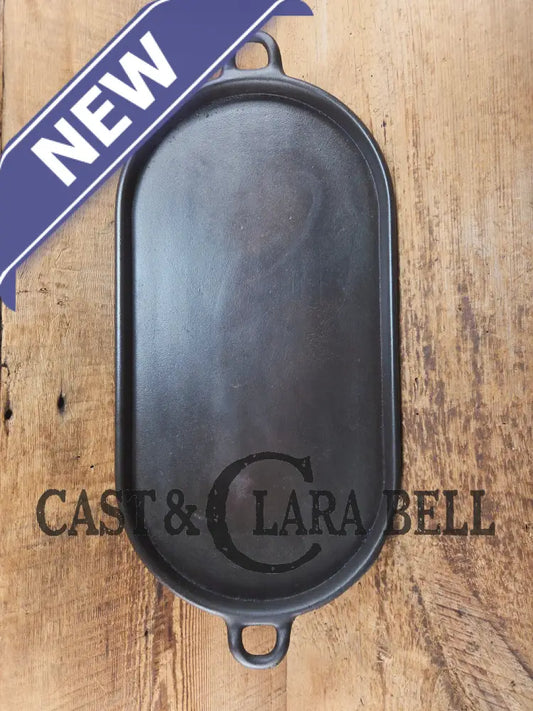 Early 1900’s (Lodge?) #7 cast iron long pan with foot nubs. Perfect for two people or quick meals. VERY cool griddle to