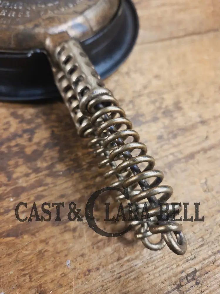 For the eclectic enthusiast!! 1920’s Griswold #8 Waffle Iron 885/886 with Matching Low Base 975. Plated paddles Black