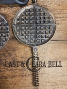 For the eclectic enthusiast!! 1920’s Griswold #8 Waffle Iron 885/886 with Matching Low Base 975. Plated paddles Black