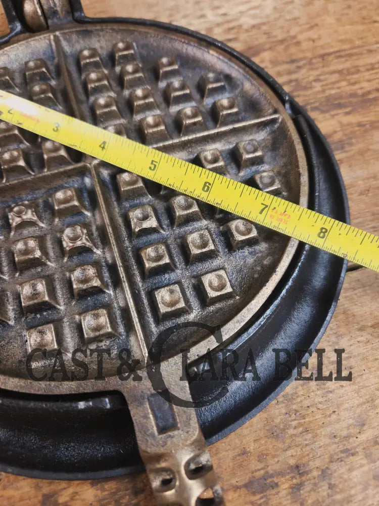 For the eclectic enthusiast!! 1920’s Griswold #8 Waffle Iron 885/886 with Matching Low Base 975. Plated paddles Black