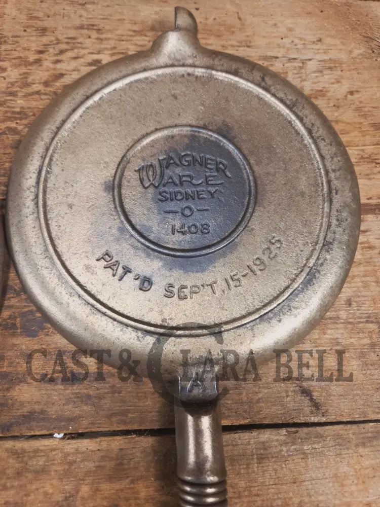 For the eclectic enthusiast!! 1930’s Era Wagner Tall Base Waffle Iron with Nickel Finish Paddles! Really cool patina!