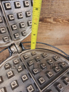For the eclectic enthusiast!! 1930’s Era Wagner Tall Base Waffle Iron with Nickel Finish Paddles! Really cool patina!