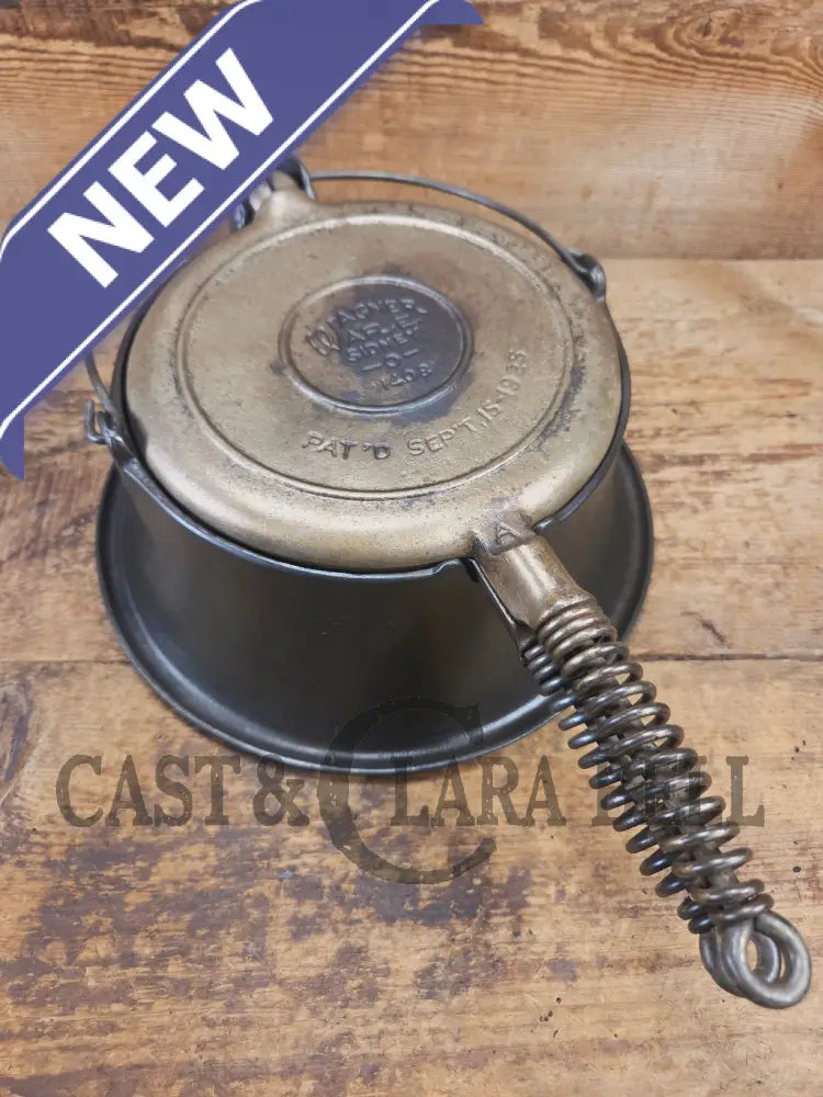 For the eclectic enthusiast!! 1930’s Era Wagner Tall Base Waffle Iron with Nickel Finish Paddles! Really cool patina!