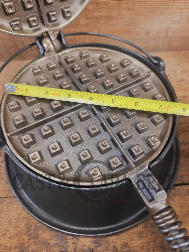 For the eclectic enthusiast!! 1930’s Era Wagner Tall Base Waffle Iron with Nickel Finish Paddles! Really cool patina!