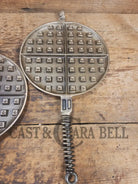 For the eclectic enthusiast!! 1930’s Era Wagner Tall Base Waffle Iron with Nickel Finish Paddles! Really cool patina!