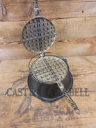 For the eclectic enthusiast!! 1930’s Era Wagner Tall Base Waffle Iron with Nickel Finish Paddles! Really cool patina!