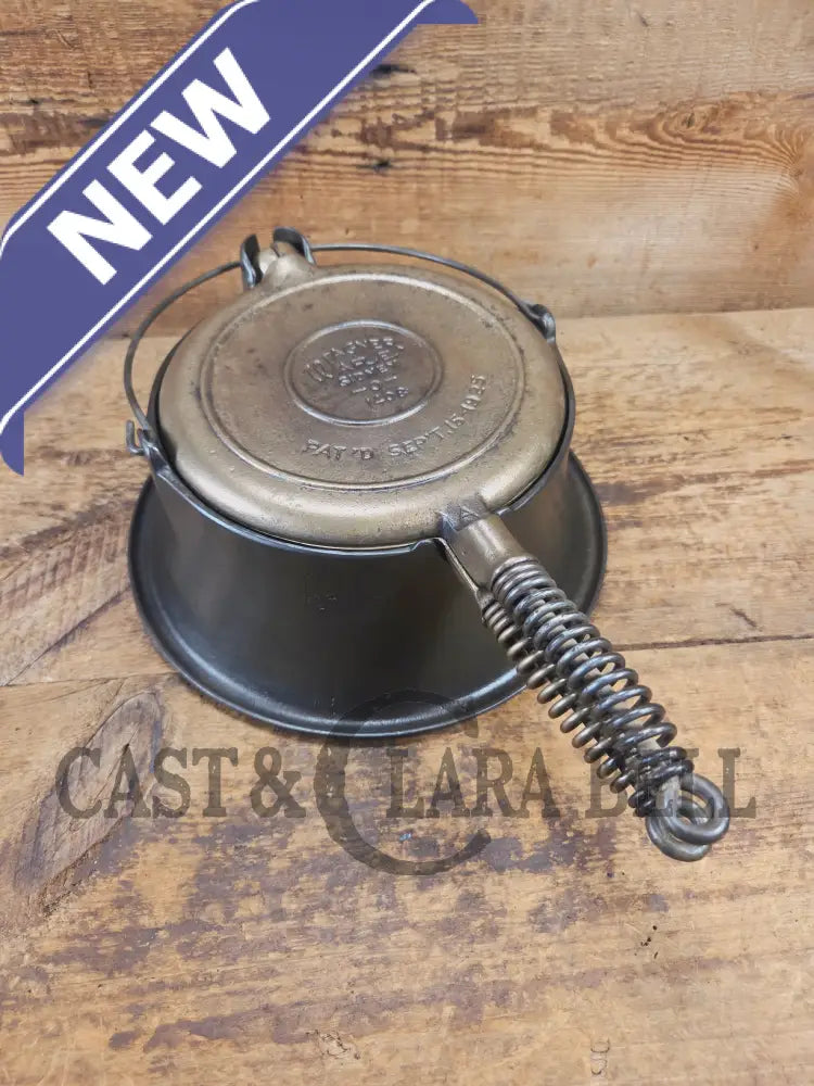 For the eclectic enthusiast!! 1930’s Era Wagner Tall Base Waffle Iron with Nickel Finish Paddles! Really cool patina!