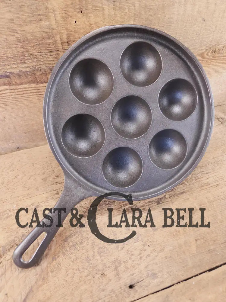 Fun to cook with! 1930’s Griswold No. 32 Aebleskiver 7 cup p/n 962 Variation 7. Great for Poached eggs! Restored Ready