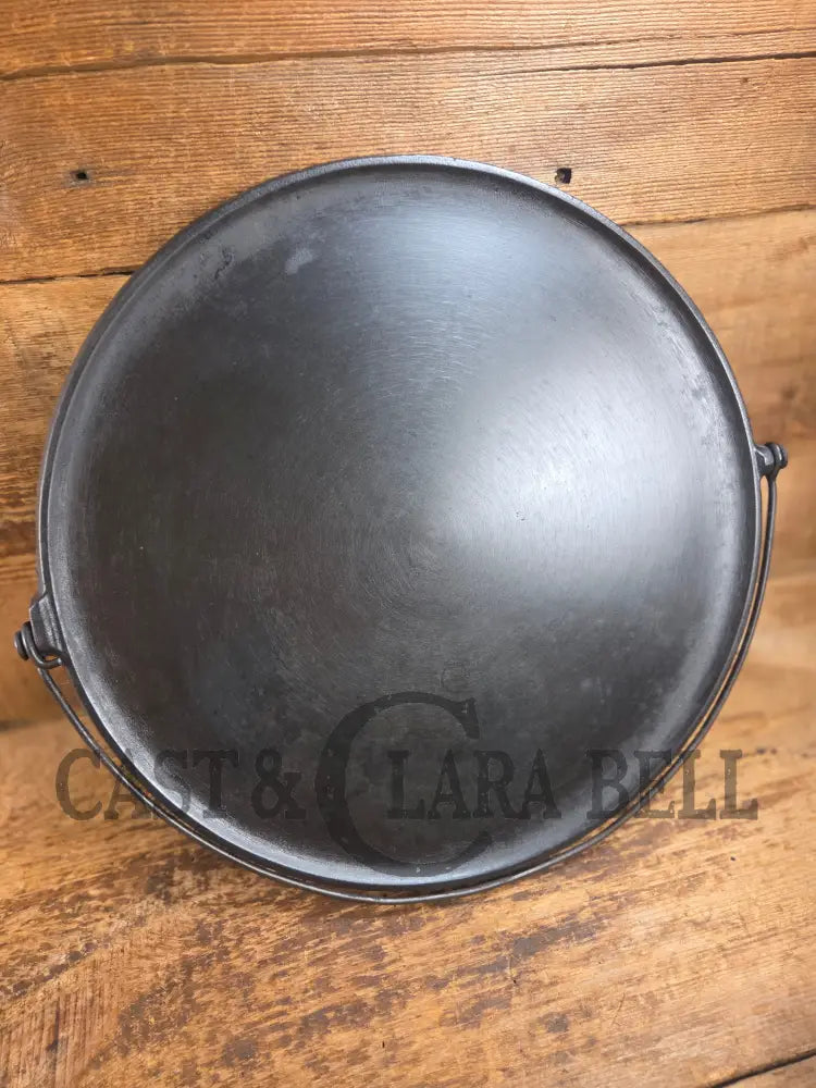 Ghostmarked 1910’s #742 Griswold No. 14 Round Griddle w/ Bail and Slant Logo. The largest made of its kind and hard to
